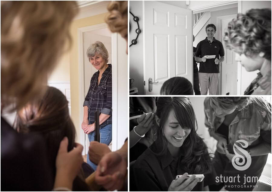 Capturing the bride getting hair and makeup prepared ahead of wedding at The Barns in Cannock by Reportage Wedding Photographer Stuart James