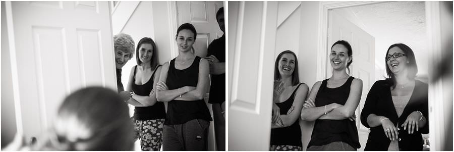 Photos of the bride and the bridesmaids getting ready at The Barns in Cannock by Reportage Wedding Photographer Stuart James