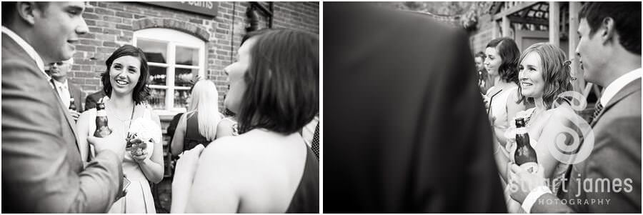 Candid photos of guests during drinks reception at The Barns in Cannock by Staffordshire Wedding Photographer Stuart James