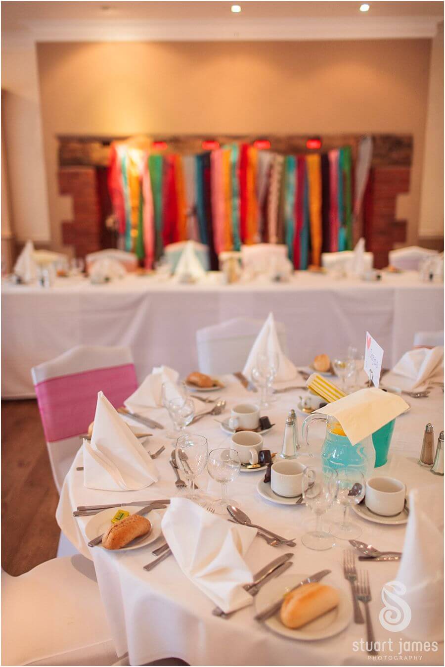 Stunning setting for wedding breakfast in dining room at The Barns in Cannock by Reportage Wedding Photographer Stuart James