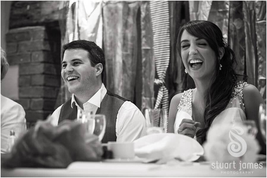 Father of the Bride enjoying his speech at The Barns in Cannock by Reportage Wedding Photographer Stuart James