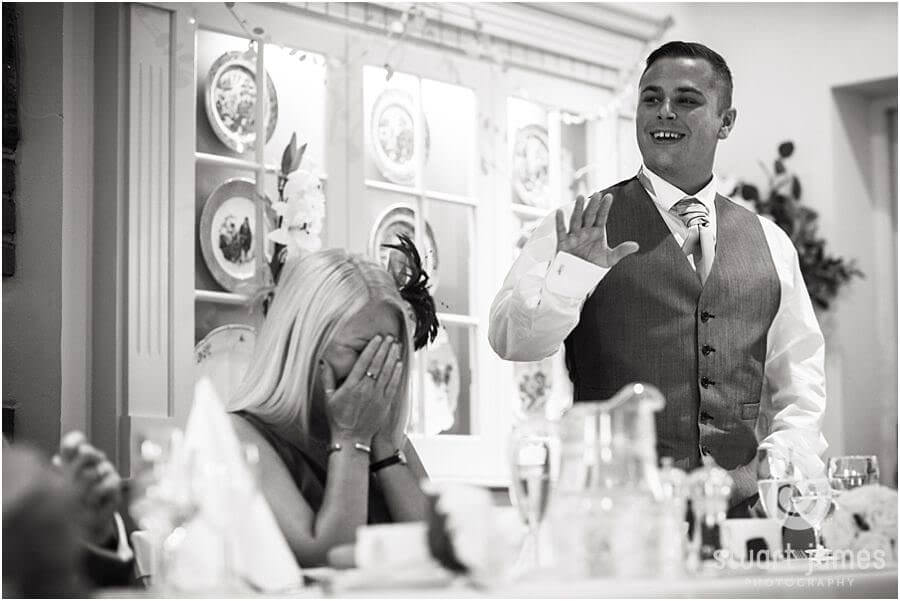 Fantastic reactions to the best mans speech at The Barns in Cannock by Documentary Wedding Photographer Stuart James