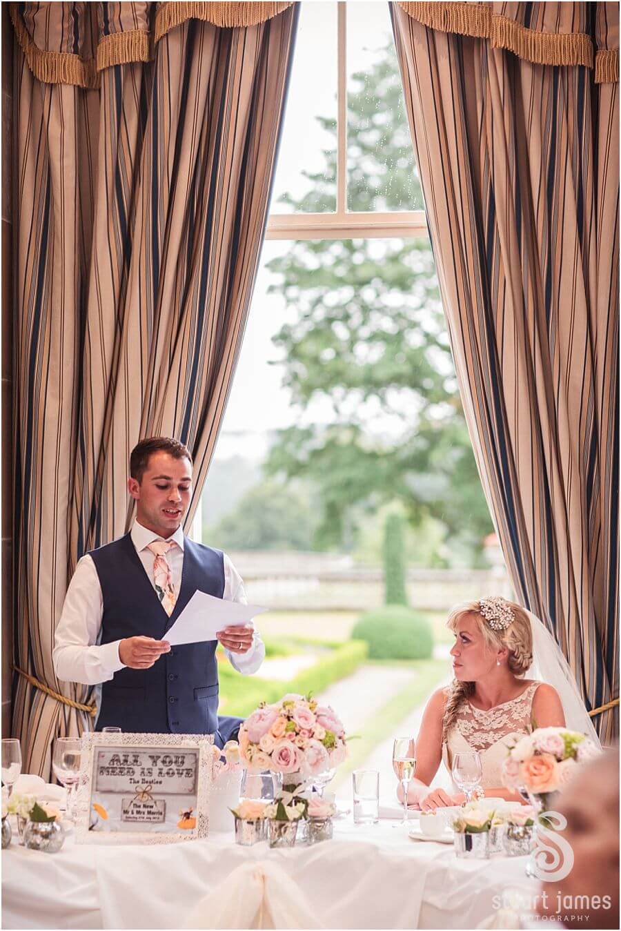 Unobtrusive photos of the wedding speeches and toasts at Weston Park in Staffordshire by Documentary Wedding Photographer Stuart James