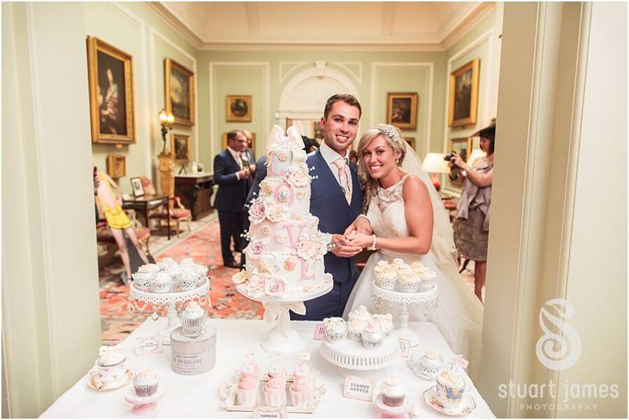 Beautiful vintage wedding cake at Weston Park in Staffordshire by Reportage Wedding Photographer Stuart James