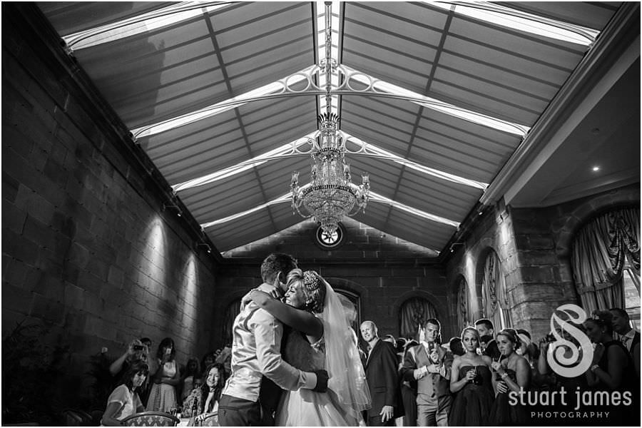 Photographs of brilliant first dance in front of friends and family at Weston Park in Staffordshire by Documentary Wedding Photographer Stuart James