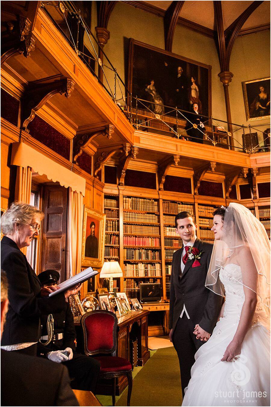 Civil wedding in library at Muncaster Castle in Ravenglass captured by Wedding Photojournalist Stuart James