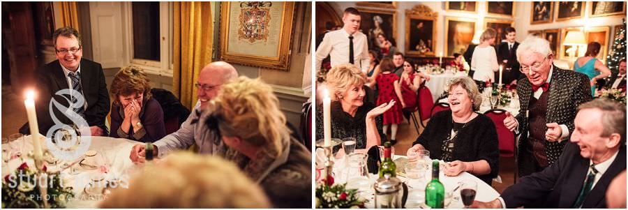 Family wedding reception with close magician at Muncaster Castle in Ravenglass by Documentary Wedding Photographer Stuart James