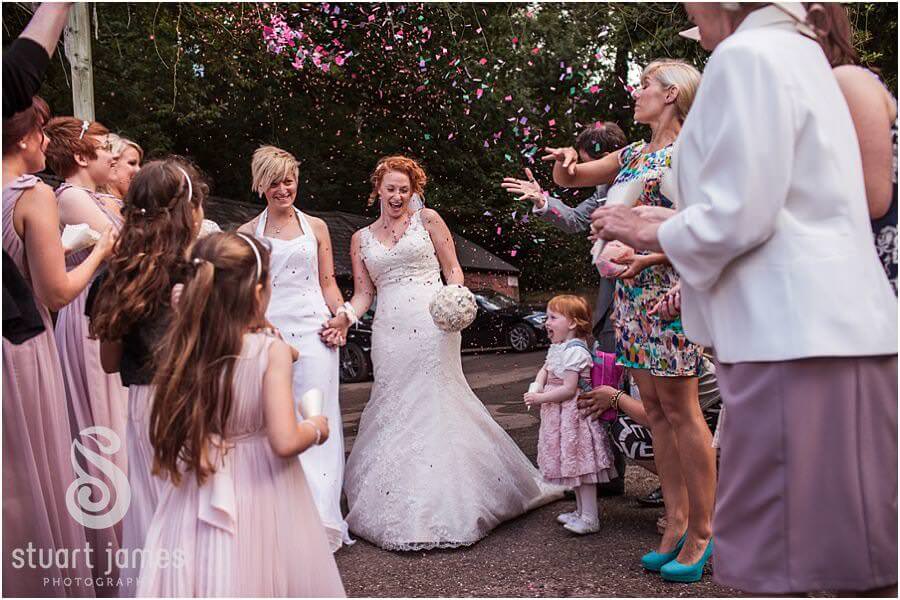 Great confetti photographs at The Boat House, Sutton Park in Sutton Coldfield by Documentary Wedding Photographer Stuart James