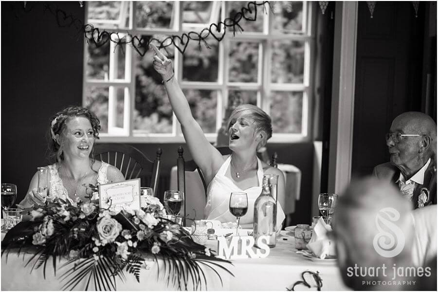 Capturing guests reactions to speeches at The Boat House, Sutton Park in Sutton Coldfield by Documentary Wedding Photographer Stuart James