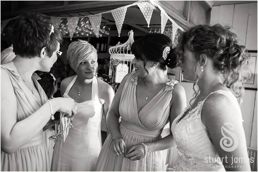 Beautiful afternoon with guests enjoying wedding reception at The Boat House, Sutton Park in Sutton Coldfield by Candid Wedding Photographer Stuart James