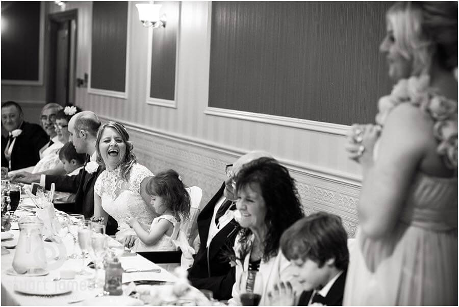Creative photos of speeches and guest reactions at The Fairlawns in Aldridge by Reportage Wedding Photographer Stuart James