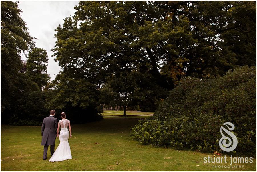 Unobtrusive and creative wedding portraits of Bride and Groom at Sandon Hall near Stafford by Stafford Wedding Photographer Stuart James