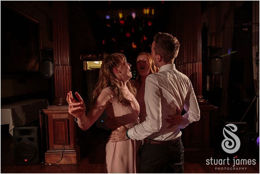 Crazy entertaining dancing and partying at Sandon Hall near Stafford by Stafford Wedding Photographer Stuart James