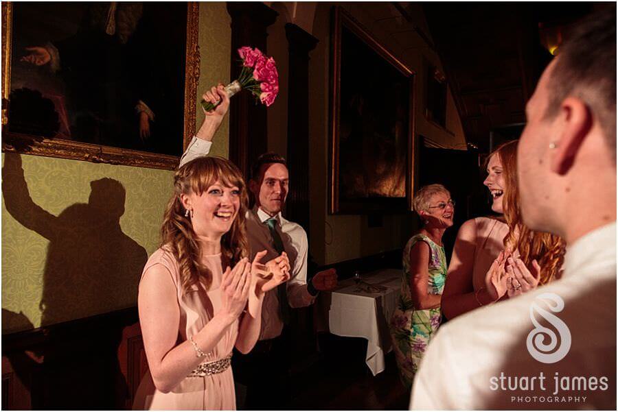 Bouquet toss fun at Sandon Hall near Stafford by Stafford Wedding Photographer Stuart James