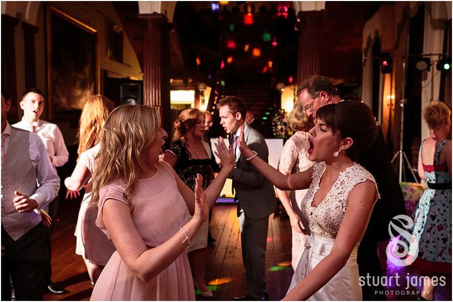 Incredibly entertaining party and dancing at Sandon Hall near Stafford by Stafford Wedding Photographer Stuart James