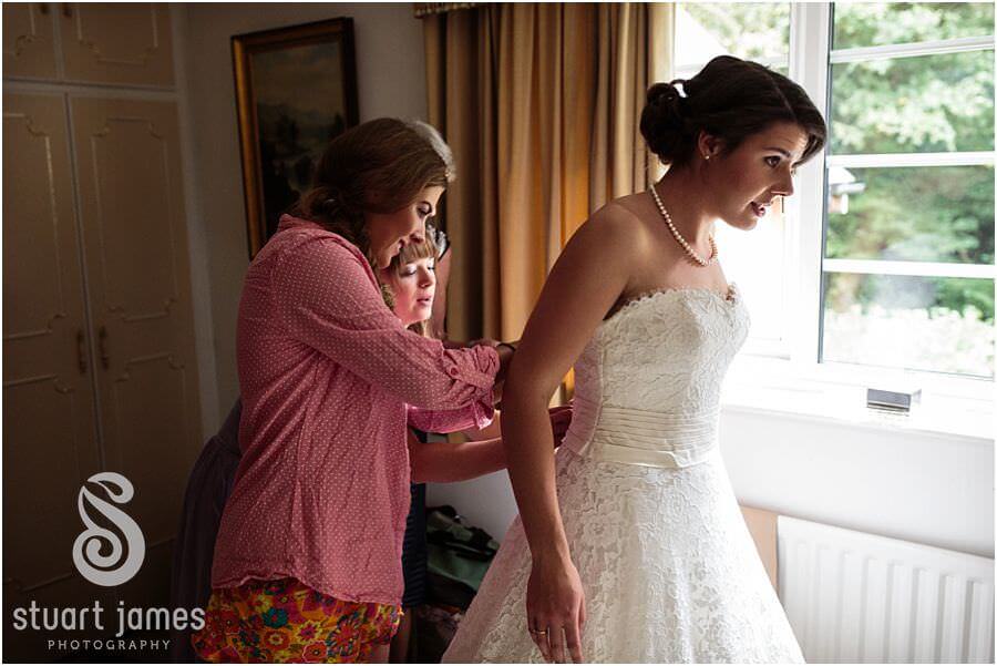 Reportage photography of groom and bridal preparations during wedding morning at Chaddesley Corbett in Worcester by Worcester Wedding Photographer Stuart James