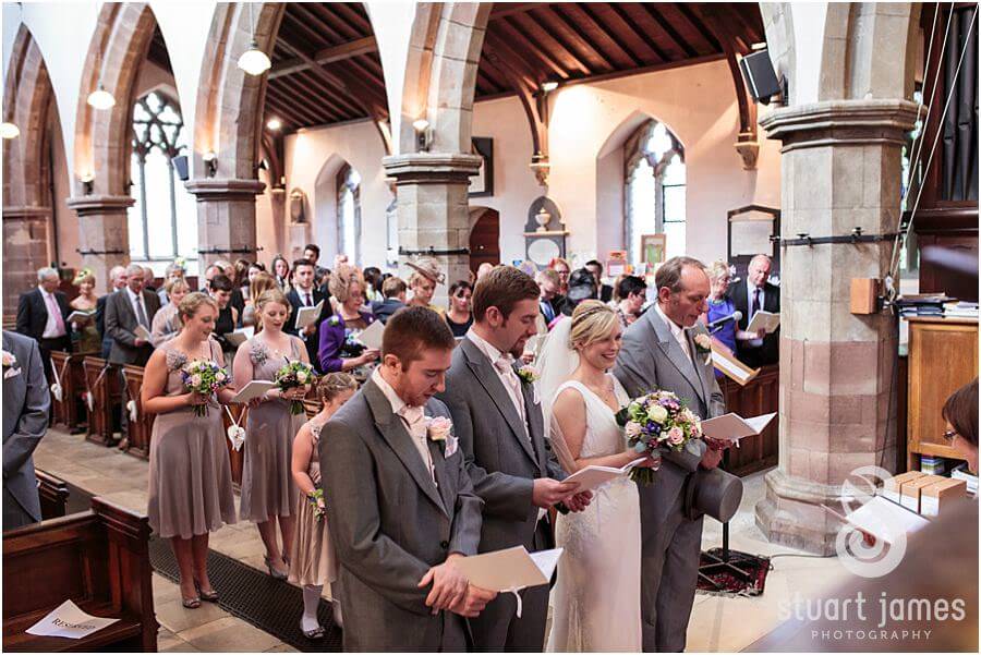 Creative storytelling wedding photography of wedding ceremony at St Chads Church near Lichfield by Lichfield Reportage Wedding Photographer Stuart James