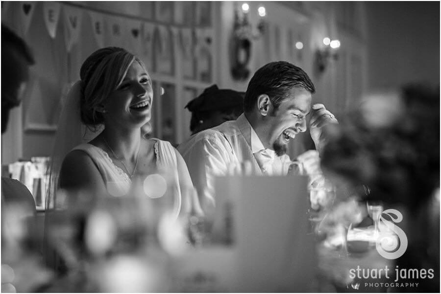 Creative documentary photographs that capture the wedding speeches and fabulous guest reactions at Moor Hall near Sutton Coldfield by Sutton Coldfield Reportage Wedding Photographer Stuart James