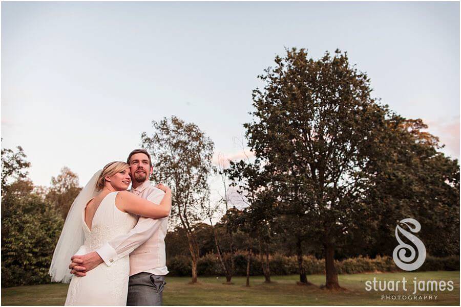 Creating beautiful evening portraits around grounds at Moor Hall near Sutton Coldfield by Sutton Coldfield Reportage Wedding Photographer Stuart James