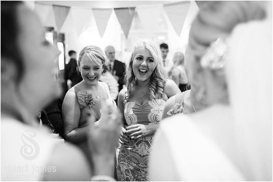 Reportage photo of the wedding guests enjoying evening reception at Moor Hall near Sutton Coldfield by Sutton Coldfield Reportage Wedding Photographer Stuart James