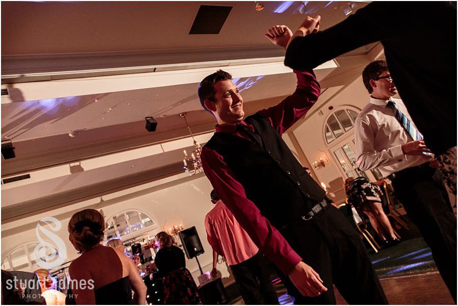 Capturing the fun and excitement during dancing at Moor Hall near Sutton Coldfield by Sutton Coldfield Reportage Wedding Photographer Stuart James