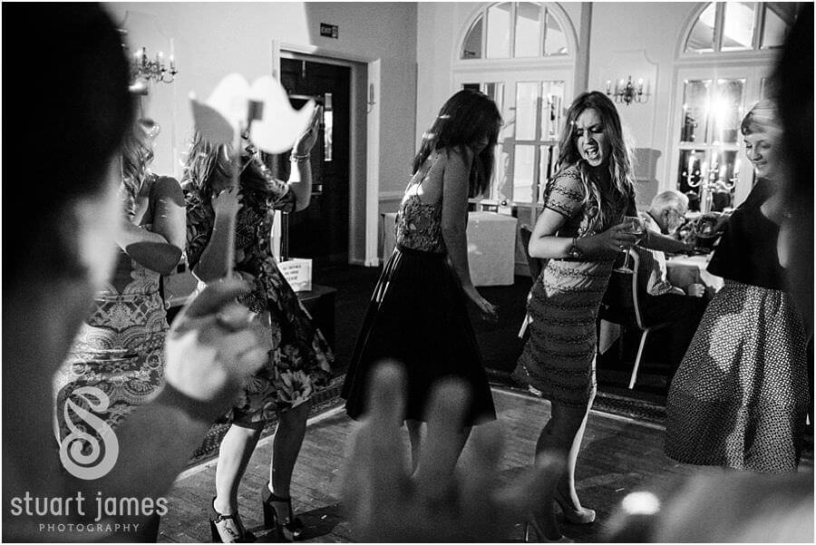 Capturing the fun and excitement during dancing at Moor Hall near Sutton Coldfield by Sutton Coldfield Reportage Wedding Photographer Stuart James
