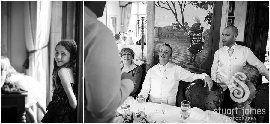Documentary wedding photographs that capture the emotion, reaction and laughter during speeches at Wroxhall Hall in Warwickshire by Warwickshire Documentary Wedding Photographer Stuart James