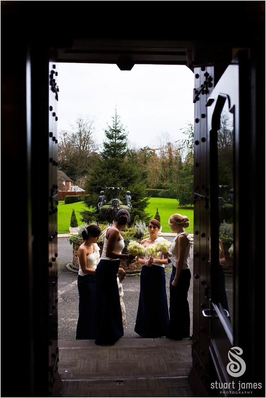 Capturing the emotional arrival of the bride at Rowton Castle in Shrewsbury by Shrewsbury Documentary Wedding Photographer Stuart James