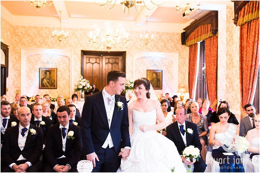 Capturing the emotional arrival of the bride at Rowton Castle in Shrewsbury by Shrewsbury Documentary Wedding Photographer Stuart James