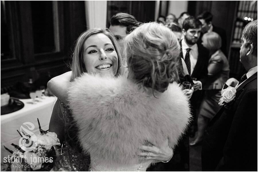 Candid photos of the wedding guests enjoying the drinks reception at Sandon Hall in Stafford by Staffordshire Wedding Photographer Stuart James