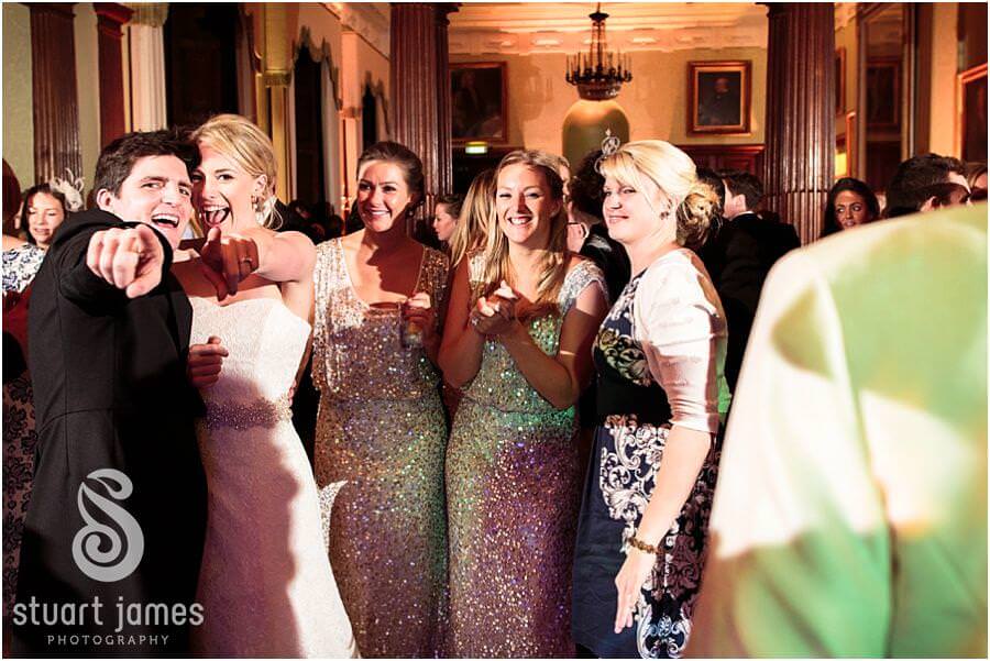Creative evening photography of fabulous dancing and partying at Sandon Hall in Stafford by Staffordshire Reportage Wedding Photographer Stuart James