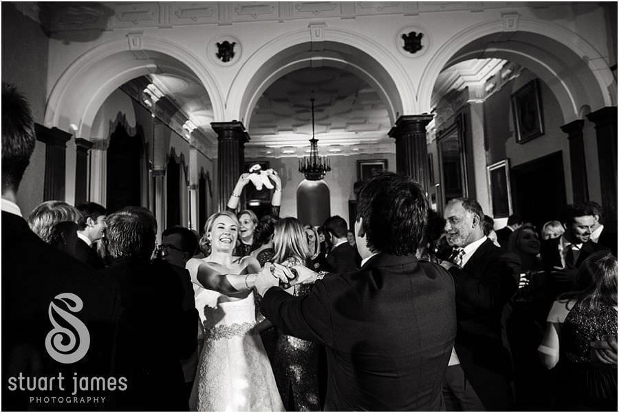 Wedding photos that capture the fun of the dancing and party at Sandon Hall in Stafford by Staffordshire Reportage Wedding Photographer Stuart James