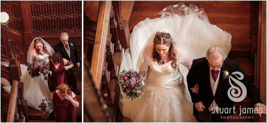 Capturing the brides entrance to the ceremony in the library at Sandon Hall in Stafford by Documentary Wedding Photographer Stuart James