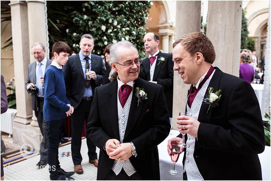Candid photos of the guests enjoying the drinks reception at Sandon Hall in Stafford by Stafford Wedding Photographer Stuart James