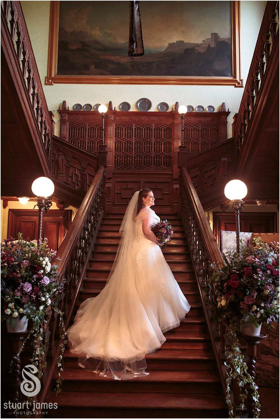 Creative traditional portraits using the grand staircase at Sandon Hall in Stafford by Stafford Wedding Photographer Stuart James