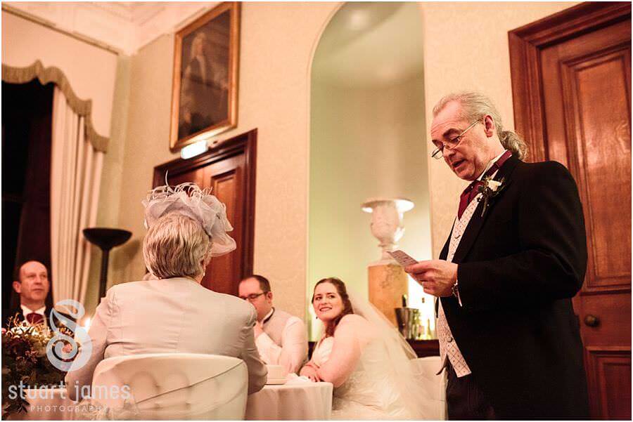 Capturing the magic of the wedding speeches with reportage photographs at Sandon Hall in Stafford by Stafford Candid Wedding Photographer Stuart James