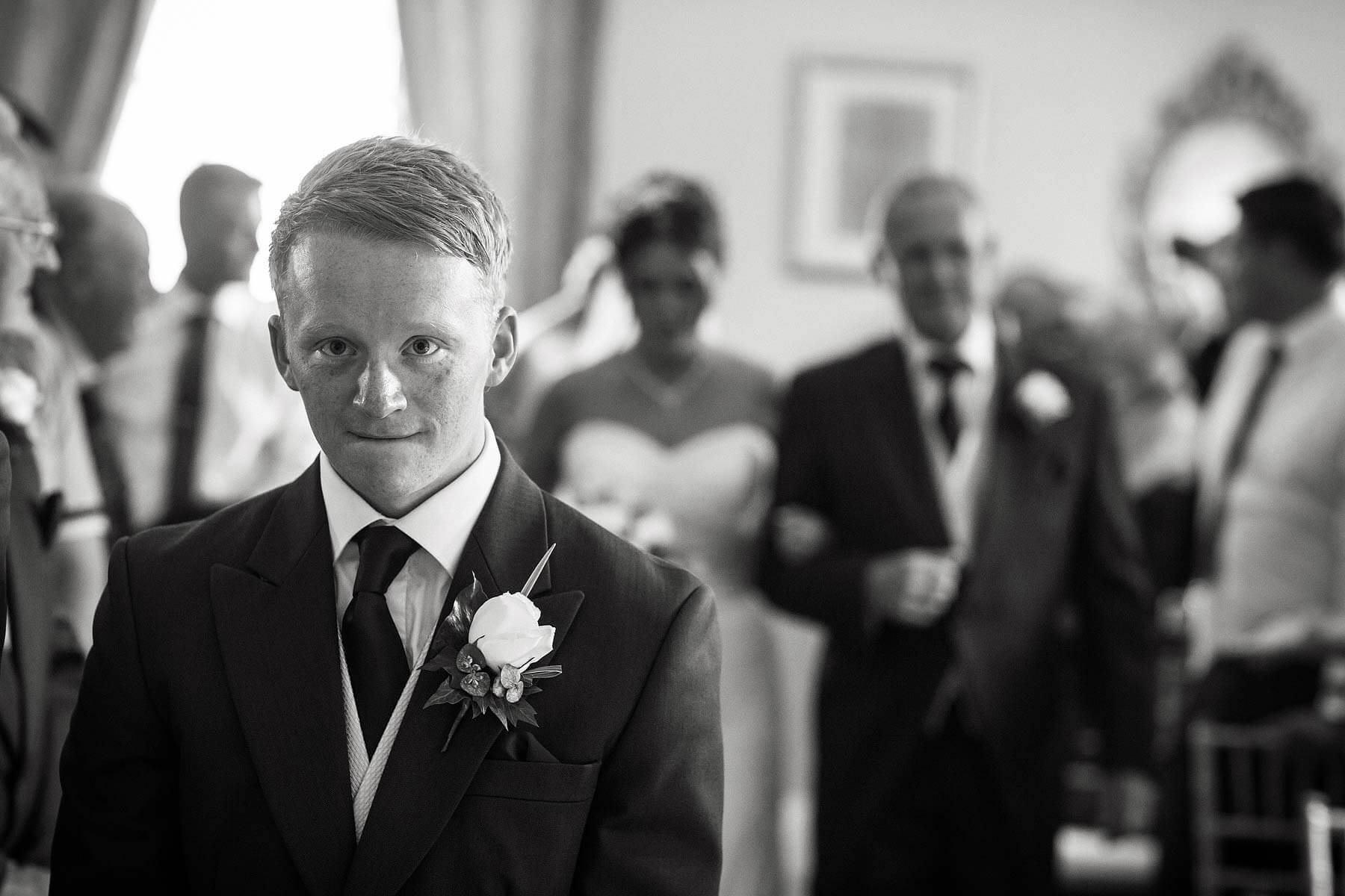Emotional wedding ceremony entrance at Somerford Hall in Brewood by Documentary Wedding Photographer Stuart James