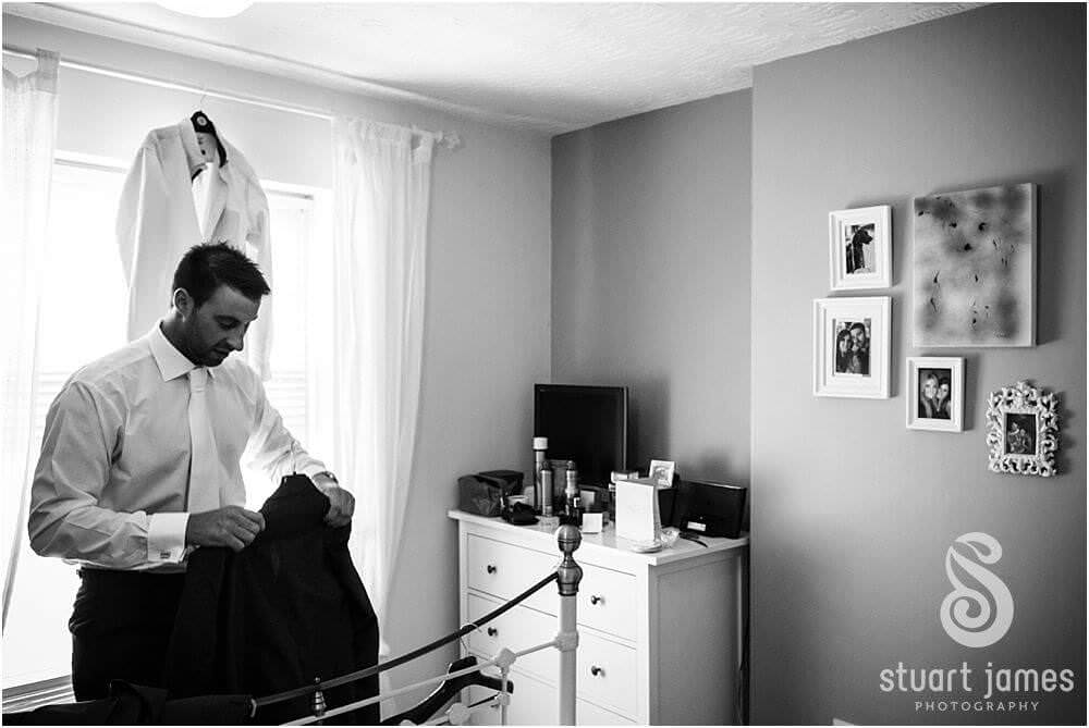 Capturing the mood and emotion through wedding photos of the morning at Bridal Parents House in Rugeley by Documentary Wedding Photographer Stuart James