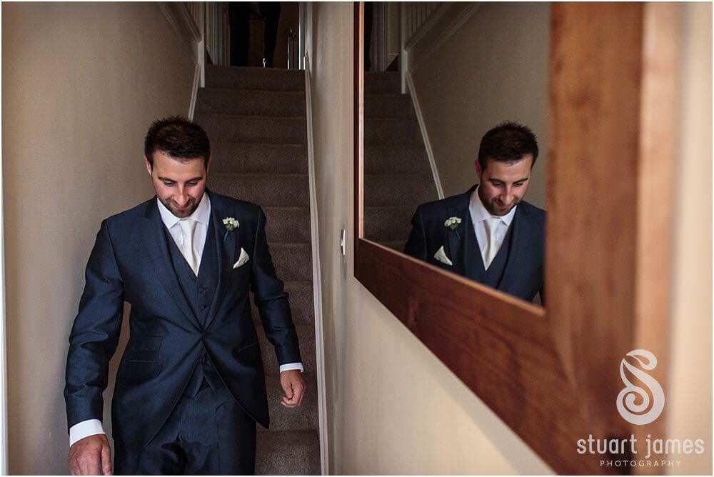 Capturing the mood and emotion through wedding photos of the morning at Bridal Parents House in Rugeley by Documentary Wedding Photographer Stuart James