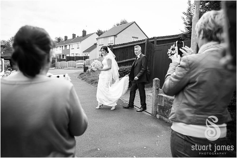 Capturing the mood and emotion through wedding photos of the morning at Bridal Parents House in Rugeley by Documentary Wedding Photographer Stuart James