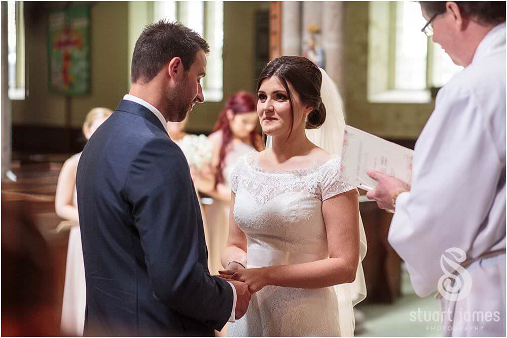 Photos that show the wedding ceremony at St Augustines Church in Rugeley by Documentary Wedding Photographer Stuart James