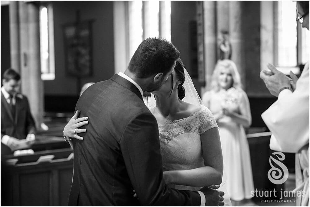 Photos that show the wedding ceremony at St Augustines Church in Rugeley by Documentary Wedding Photographer Stuart James