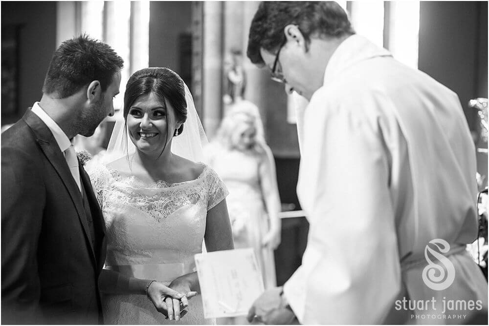 Unobtrusive photography of the wedding vows and ceremony at St Augustines Church in Rugeley by Documentary Wedding Photographer Stuart James