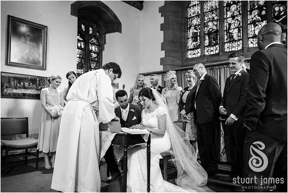 Photos that show the wedding ceremony at St Augustines Church in Rugeley by Documentary Wedding Photographer Stuart James