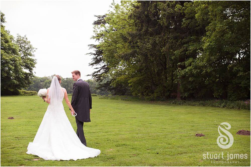 Beautiful elegant portraits of the Bride and Groom in the grounds of Somerford Hall in Brewood by Staffordshire Wedding Photographer Stuart James
