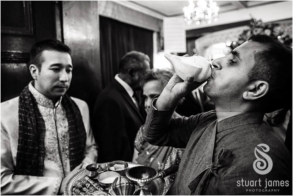 Documentary photographs of the Var Aagamana ceremony at Bhaktivedanta Manor in Watford by London Documentary Wedding Photographer Stuart James