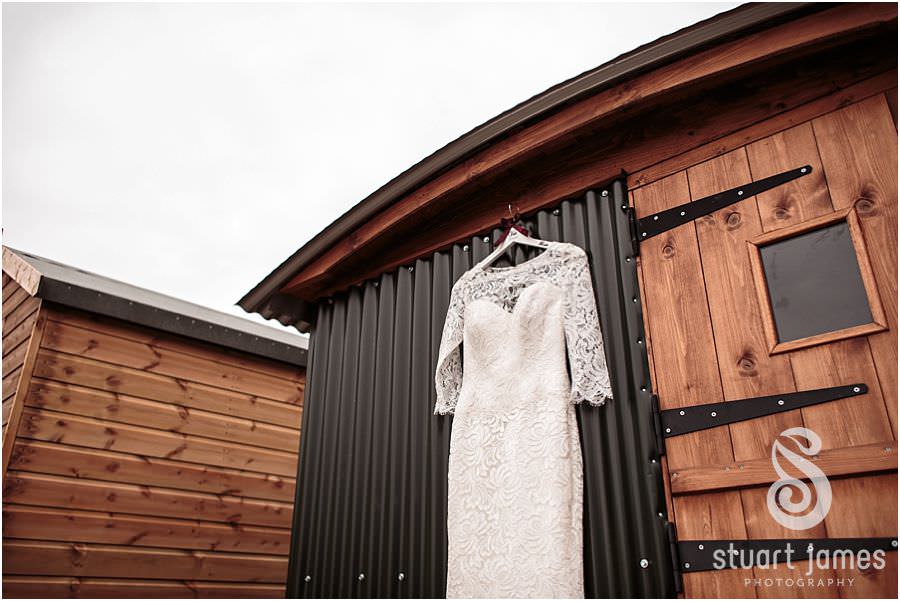 Documenting the bridal preparations at Oxleaze Barn in Gloucestershire by Documentary Wedding Photographer Stuart James