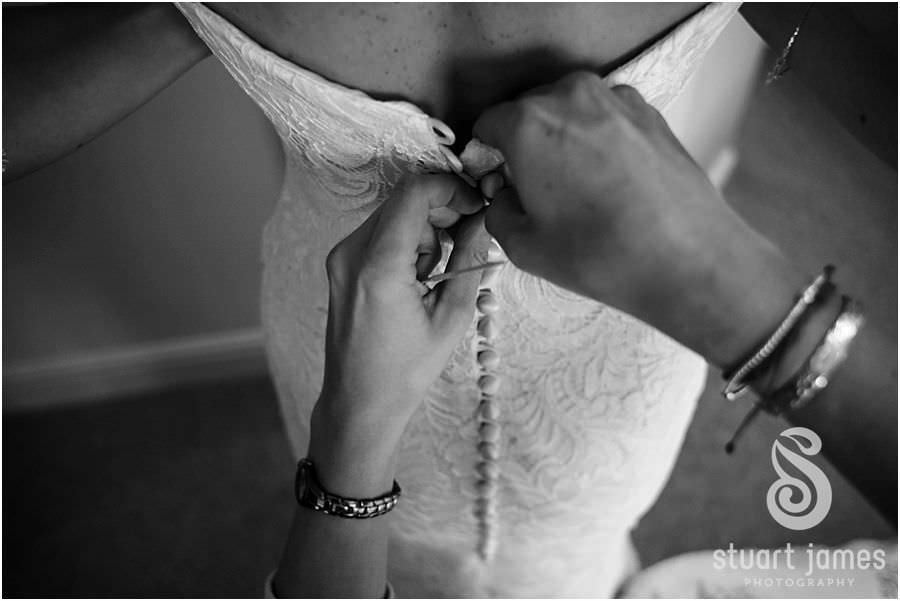 Natural photos that capture the mood and the emotion of the bridal party preparations at Oxleaze Barn in Gloucestershire by Documentary Wedding Photographer Stuart James