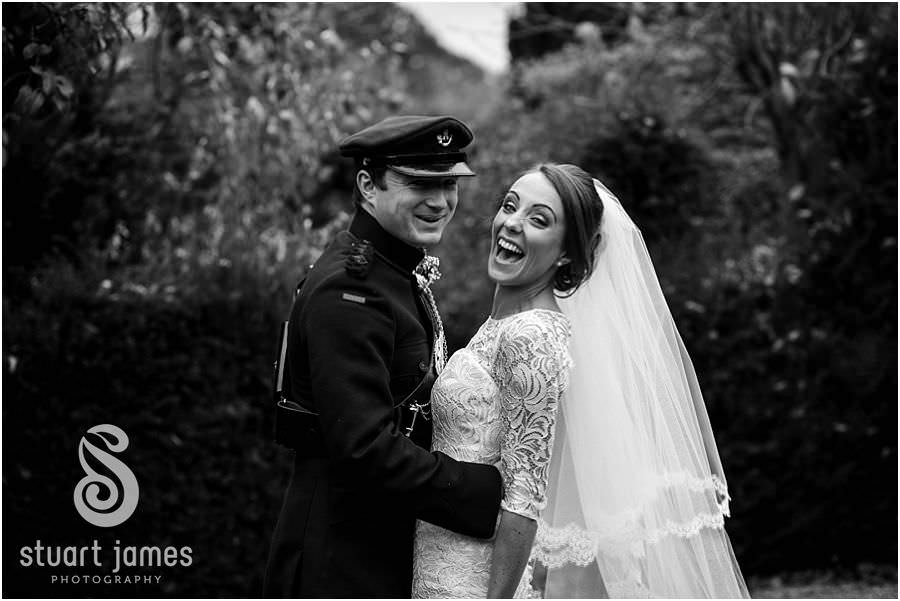 Natural elegant and fun portraits around the gardens at Oxleaze Barn in Gloucestershire by Documentary Wedding Photographer Stuart James