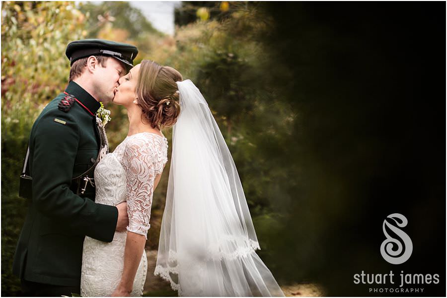 Creative beautiful portraits of the couple in the gardens at Oxleaze Barn in Gloucestershire by Documentary Wedding Photographer Stuart James